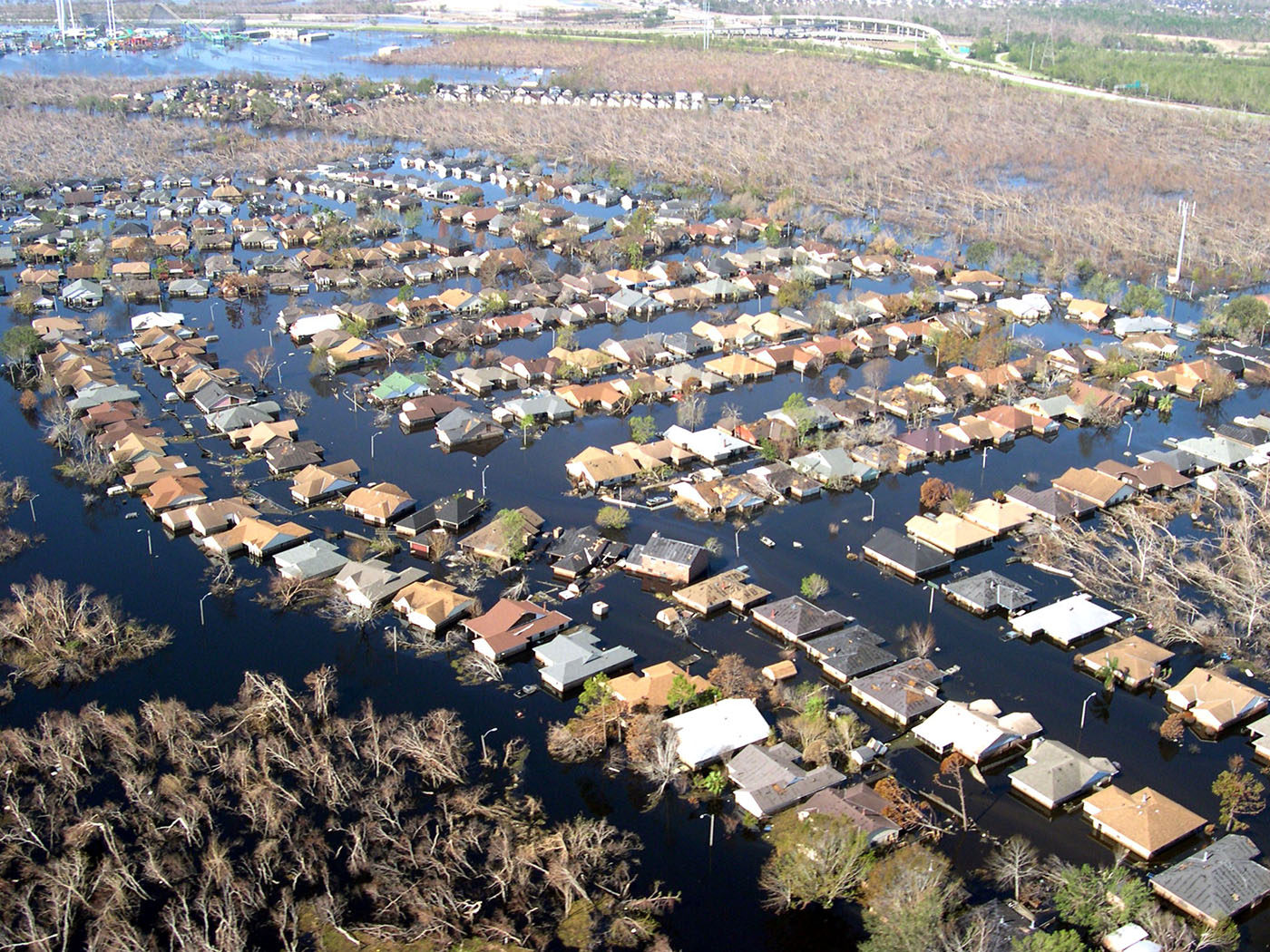 Aerial view of a neighborhood of houses in deep floodwaters Aerial view of a neighborhood of houses in deep floodwaters